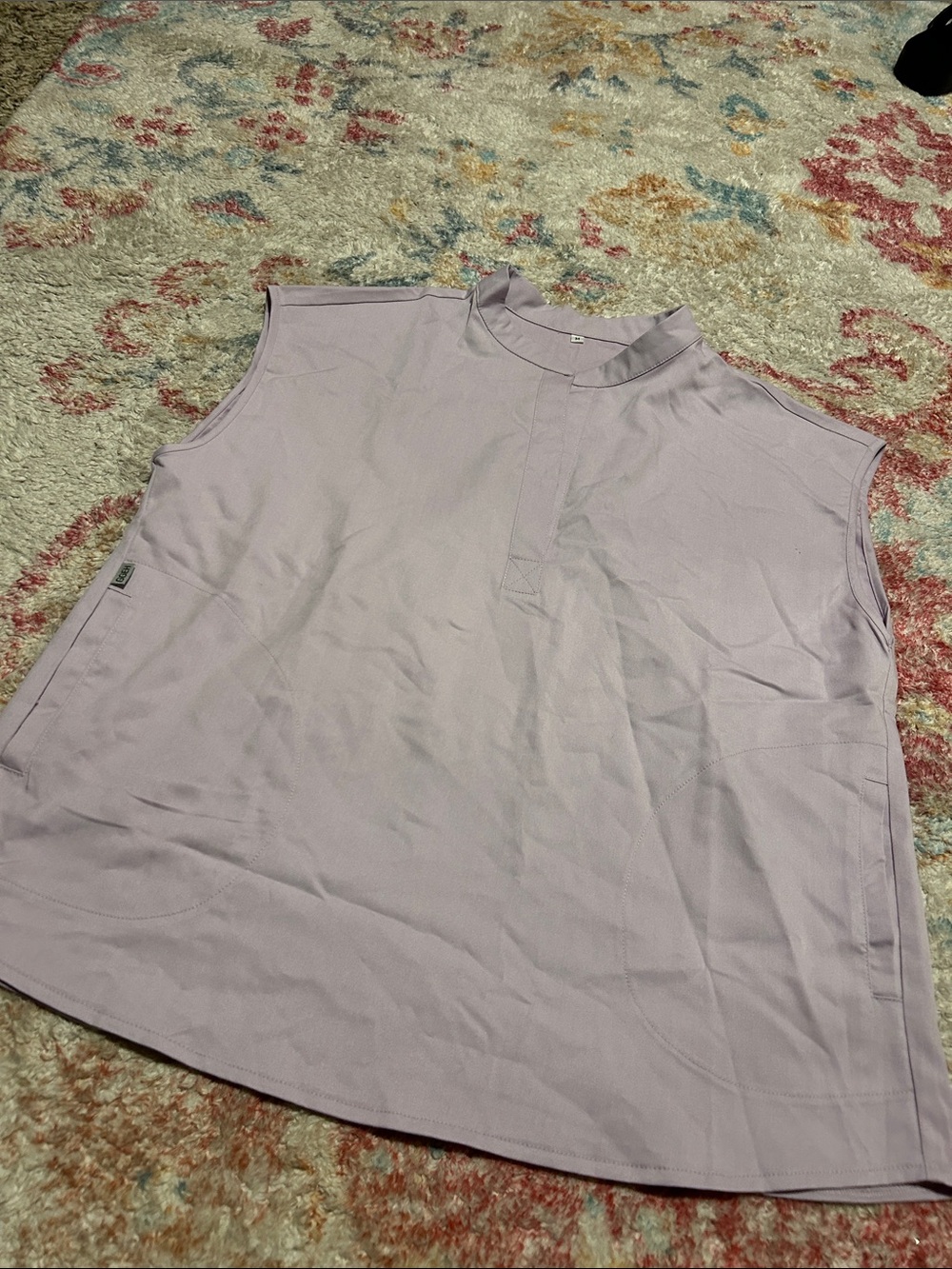 Sleeveless Women's scrub top in Lilac medium